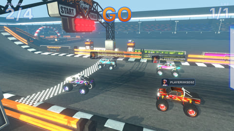 Four multiplayer trucks launching into a race on tarmac